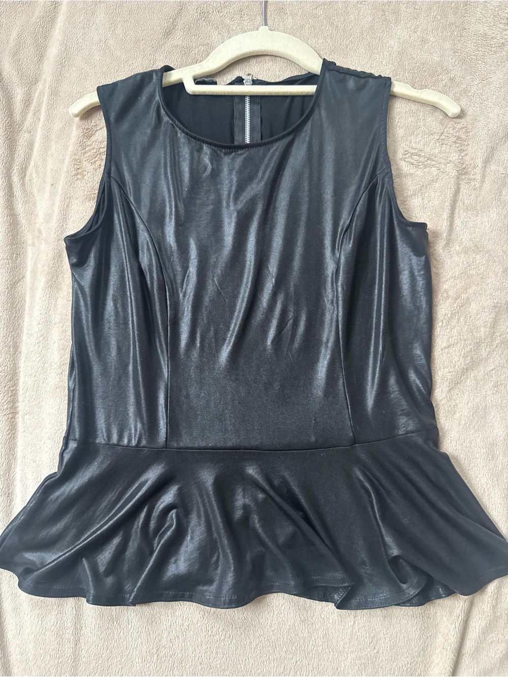 Sleeveless Black Peplum Top